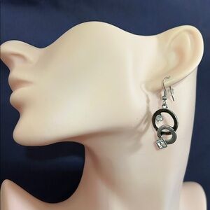 Black and rhinestone earrings